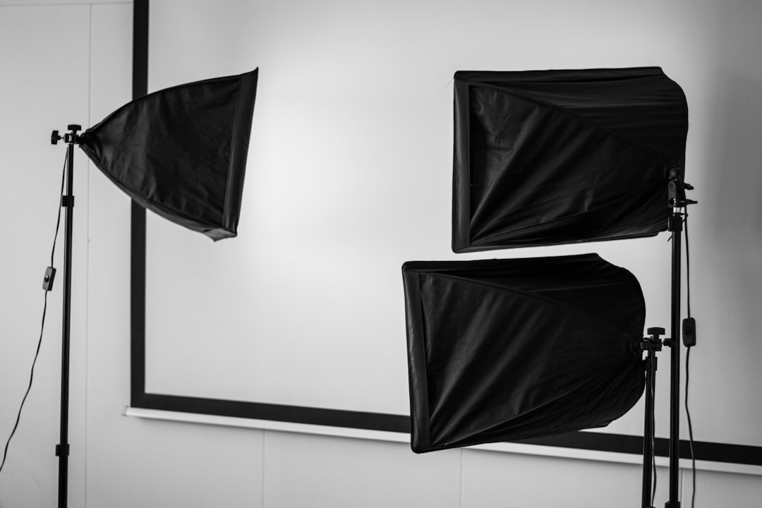 Studio lighting rig with softboxes and spotlights